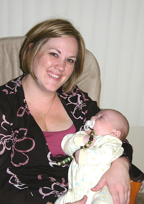 A woman holding a baby