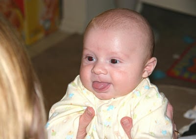 A baby being held