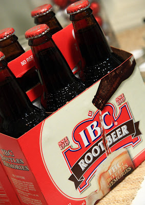 A close up of a six-pack of bottled root beer