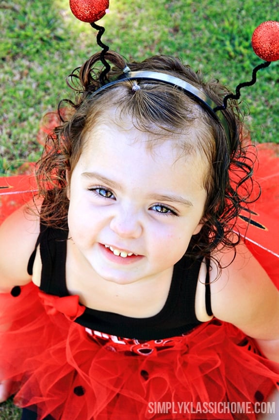 A young girl posing for a picture