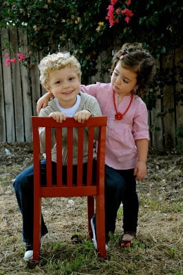 A boy and a girl outside