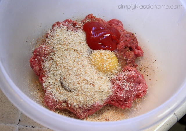 Bowl with ground beef, egg, breadcrumbs, and ketchup