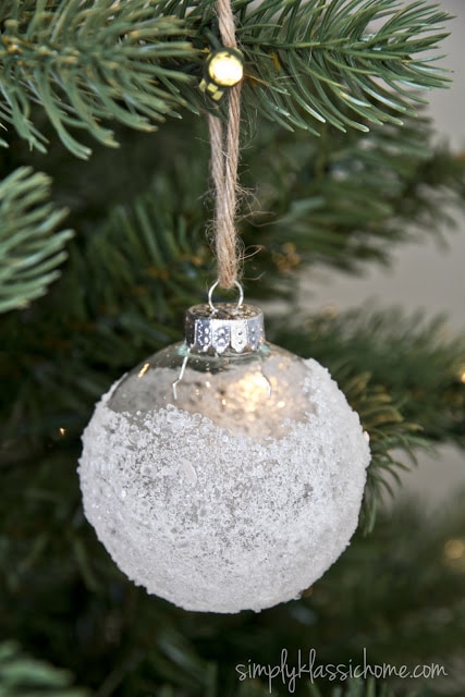 A close up of a glass ornament with epsom salt on the outside