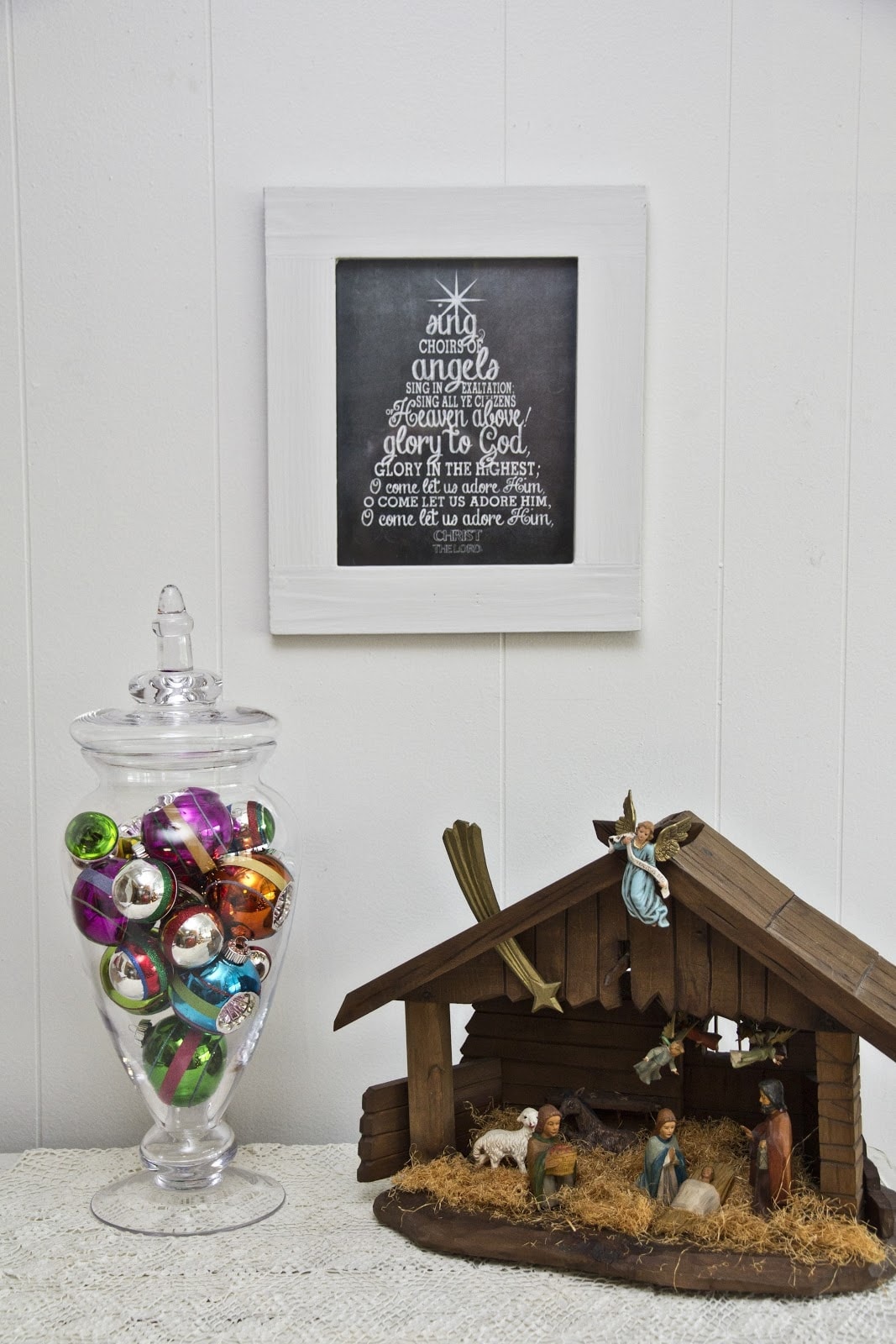 Free Christmas printable with the Christmas carol "O Come All Ye Faithful" lyrics displayed in my home.