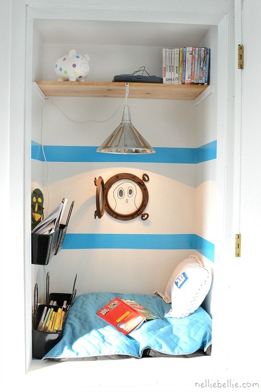 Bedroom with blue stripes on wall