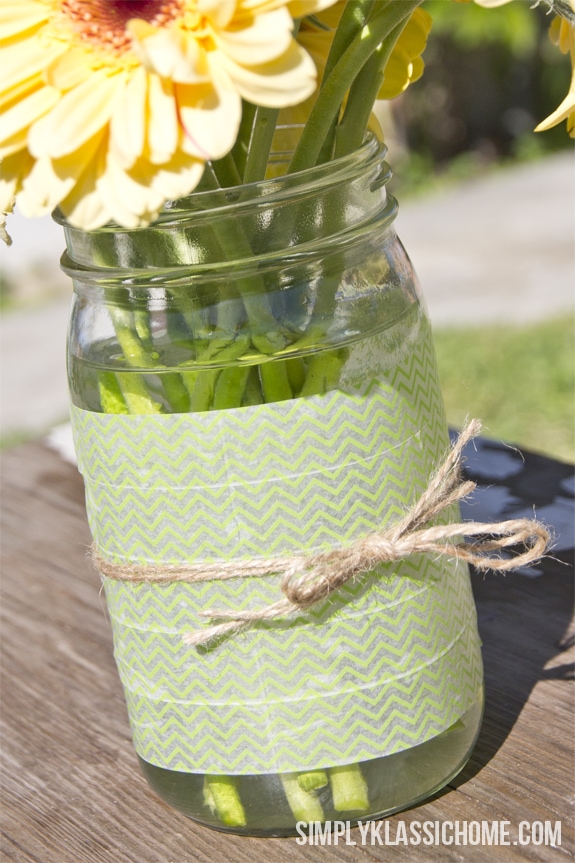 A vase filled with flowers sitting on a table