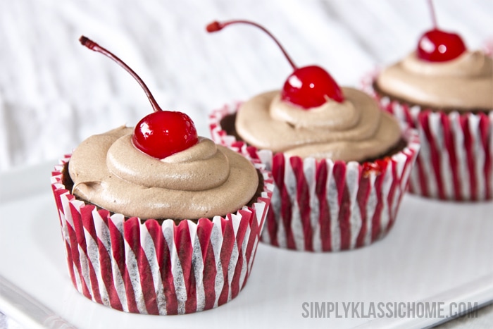 Chocolate Cherry Pie Cupcakes - The addition of Diet 7Up and Yogurt in place of the oil and eggs makes these cupcakes extra moist and delicious (and fat free!) www.yellowblissroad.com