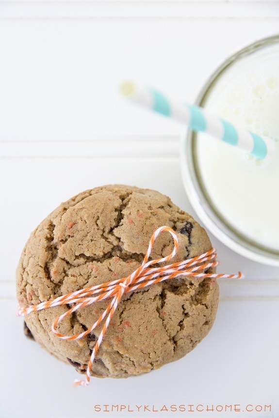 A close up of cookies and a glass of milk