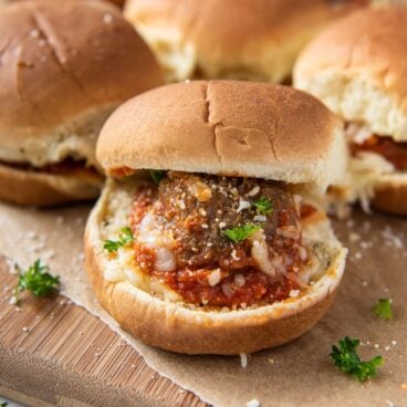 a square image of a meatball on a slide bun