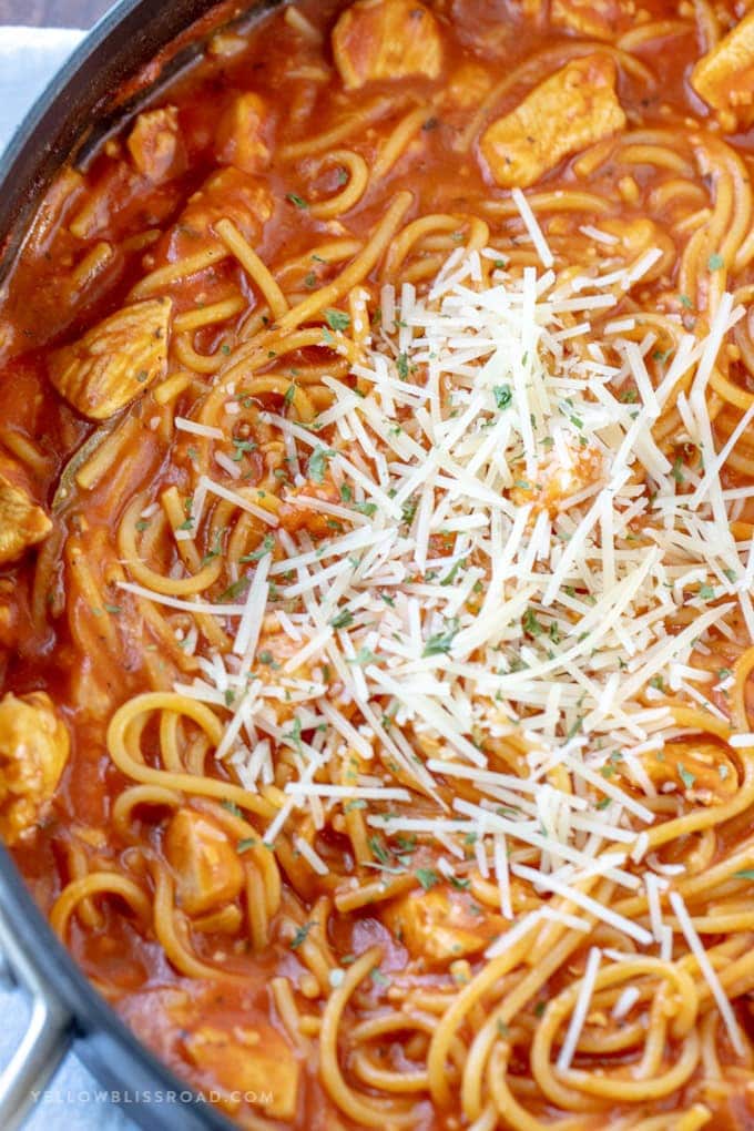 An overhead shot of One Pot Chicken Spaghetti topped with Parmesan cheese
