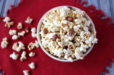 Popcorn in a bowl on a red tablecloth