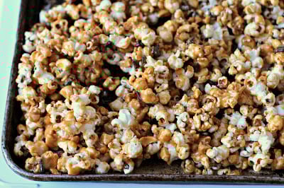 A close up of Popcorn with Chocolate and Caramel