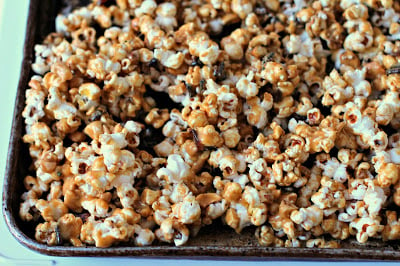 A close up of Popcorn with Chocolate and Caramel