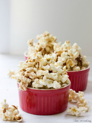 Red bowls filled with popcorn