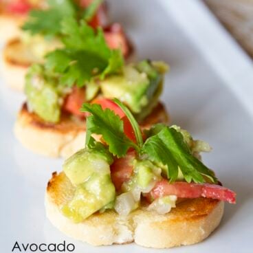 Avocado Bruschetta on a white plate