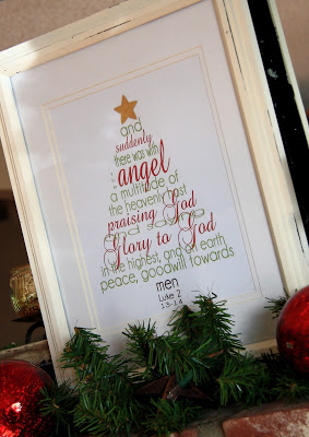 A framed Christmas tree sign