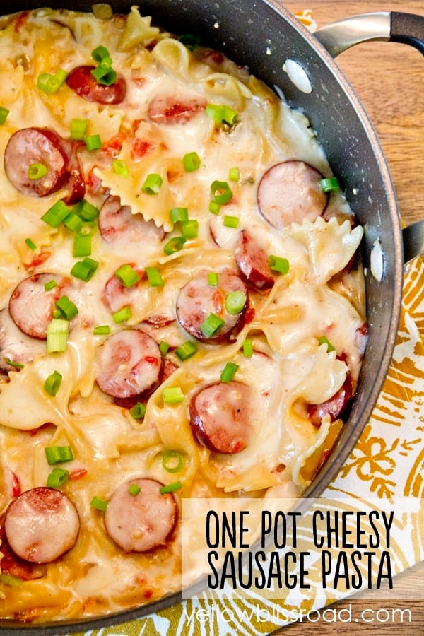 One Pot Cheesy Smoked Sausage and Pasta Skillet - A 20 minutes meal that cooks all in one pot for less mess and goes quickly from stove to table!