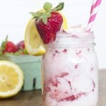 A glass of strawberry lemonade ice cream float