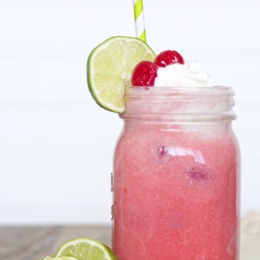 Glass of Cherry Limeade with ice cream on top