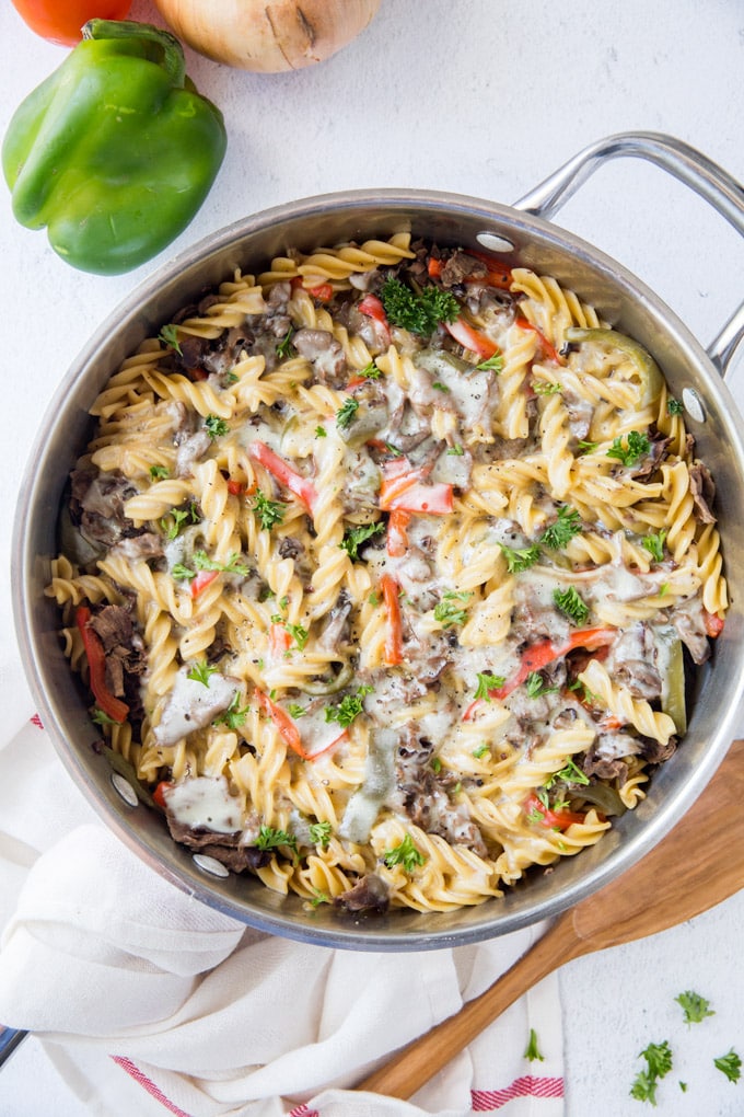 An overhead shot of a pan with philly cheesteak pasta