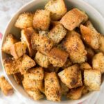A plate full of croutons
