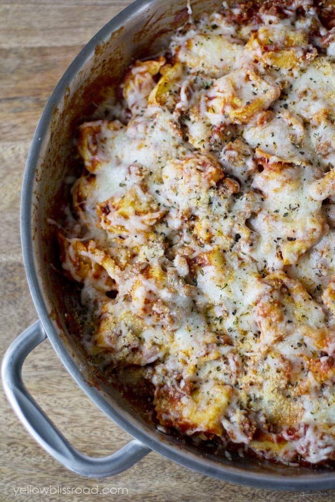 Italian Sausage & Tortellini Skillet - Just a few ingredients come together to make this incredibly cheesy dish that starts on the stove and finishes in the oven in under 30 minutes!