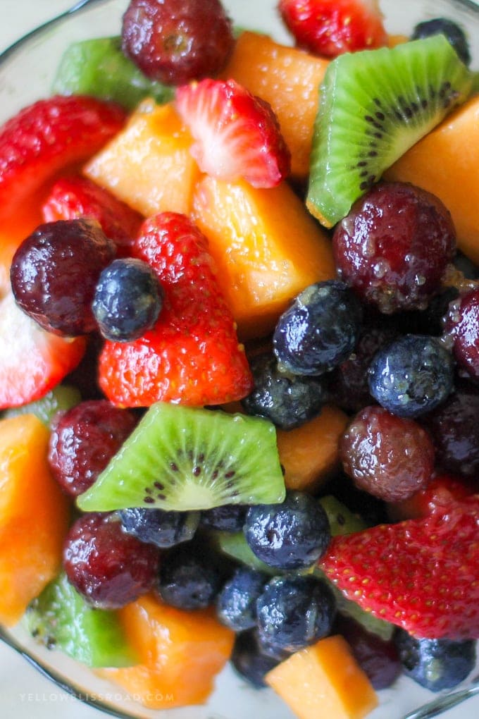 close up of fruit salad in a bowl with a vanilla pudding fruit salad dressing