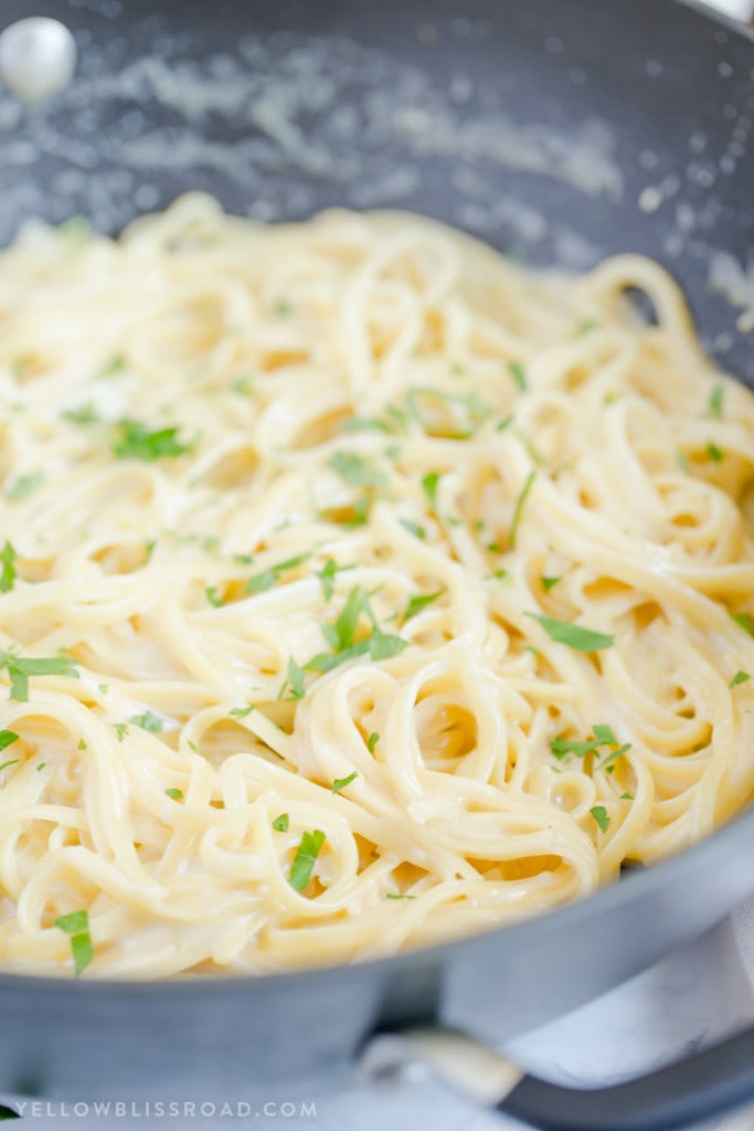 linguine with creamy garlic sauce in a large skillet