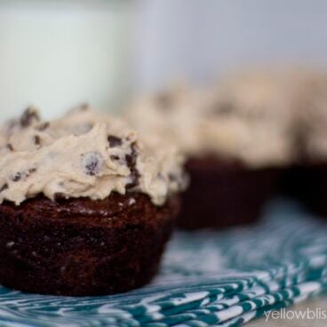 A close up of cupcakes with frosting