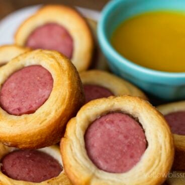 Sausage bites with a bowl of dip