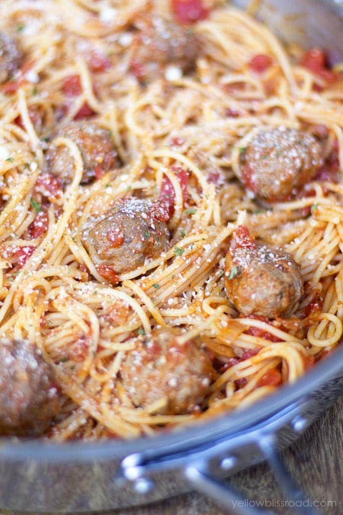 Spaghetti and Homemade Meatballs in a light and fresh Pomodoro Sauce - so easy and ready in under 30 minutes!