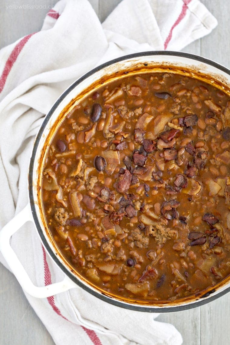 a pot full of baked beans with ground beef and bacon