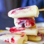 A close up of cherry vanilla popsicles