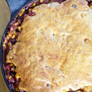 A pan with chili and cornbread