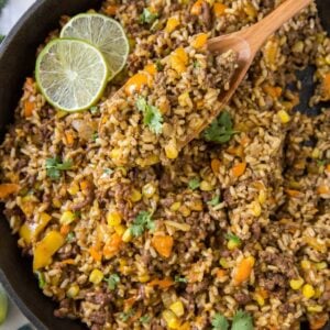 A pan of rice, veggies, and ground beef.