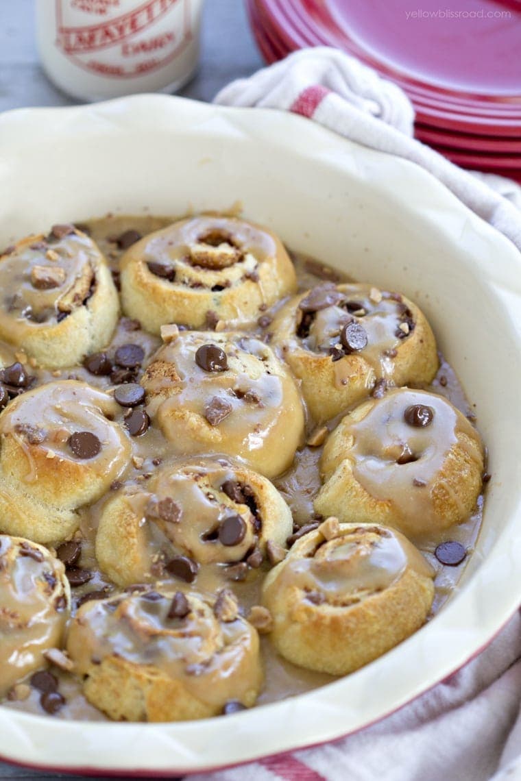 Chocolate toffee cinnamon sweet rolls with salted caramel icing