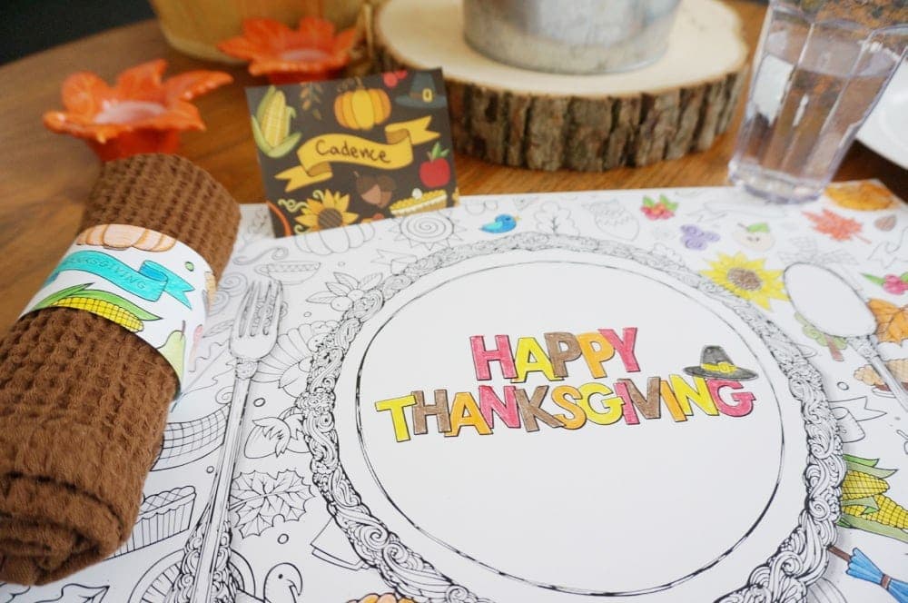 A coloring printable that says Happy Thanksgiving on the table