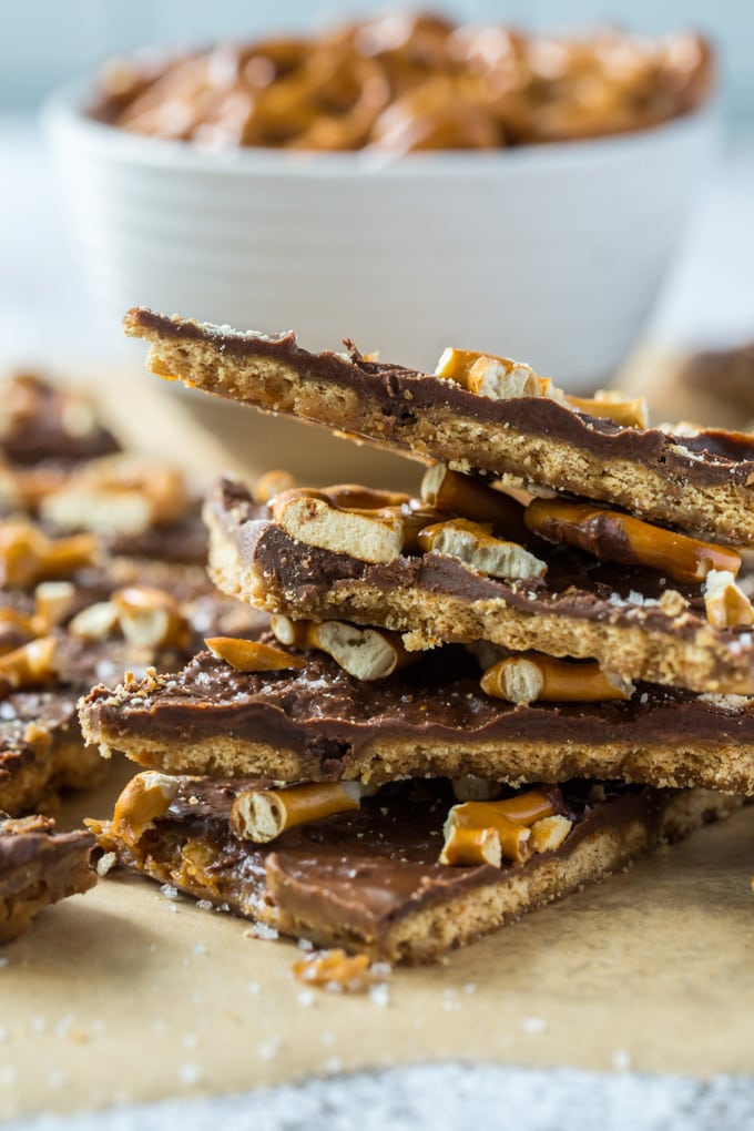 a close up of a stack of graham cracker toffee