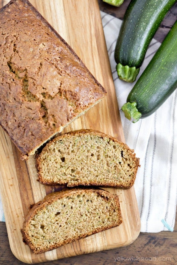 Zucchini bread on a wooden cutting board