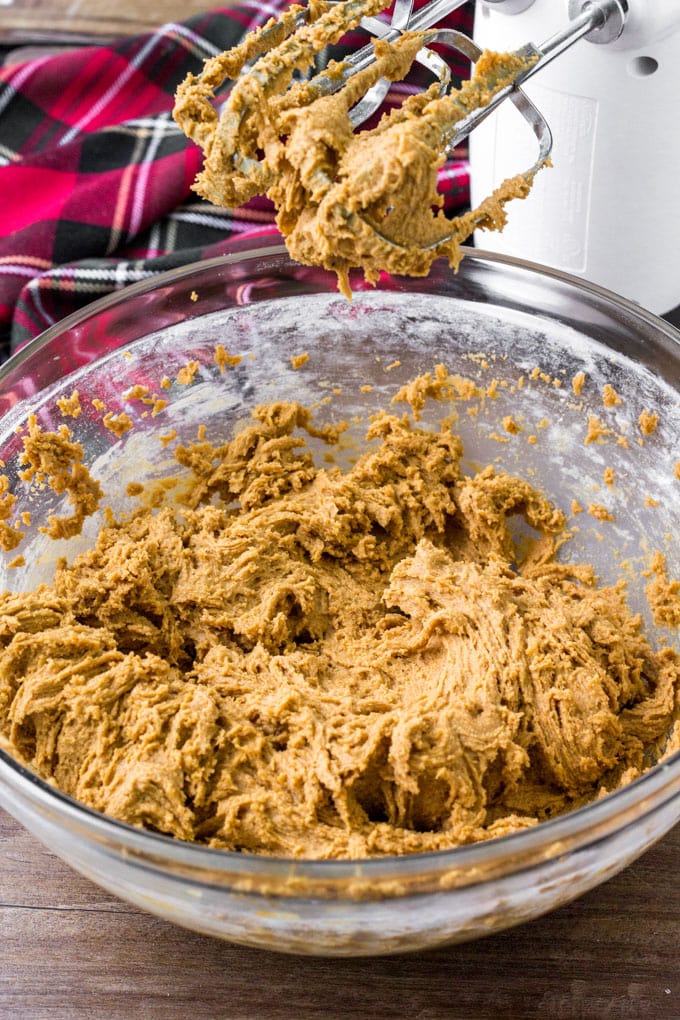 Spiced Gingerbread Cookie Bars batter in a bowl with beaters.