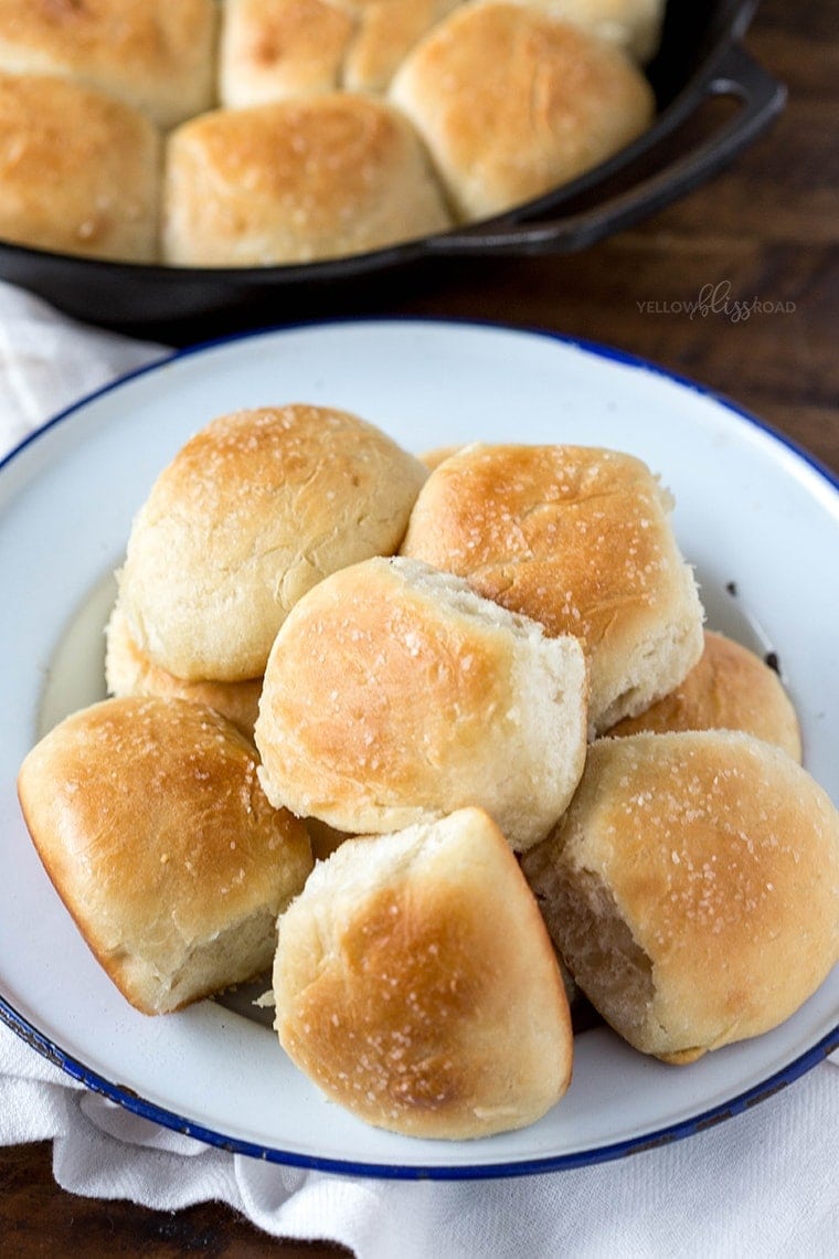 One Hour Dinner Rolls from scratch - on a plate with a wood background.