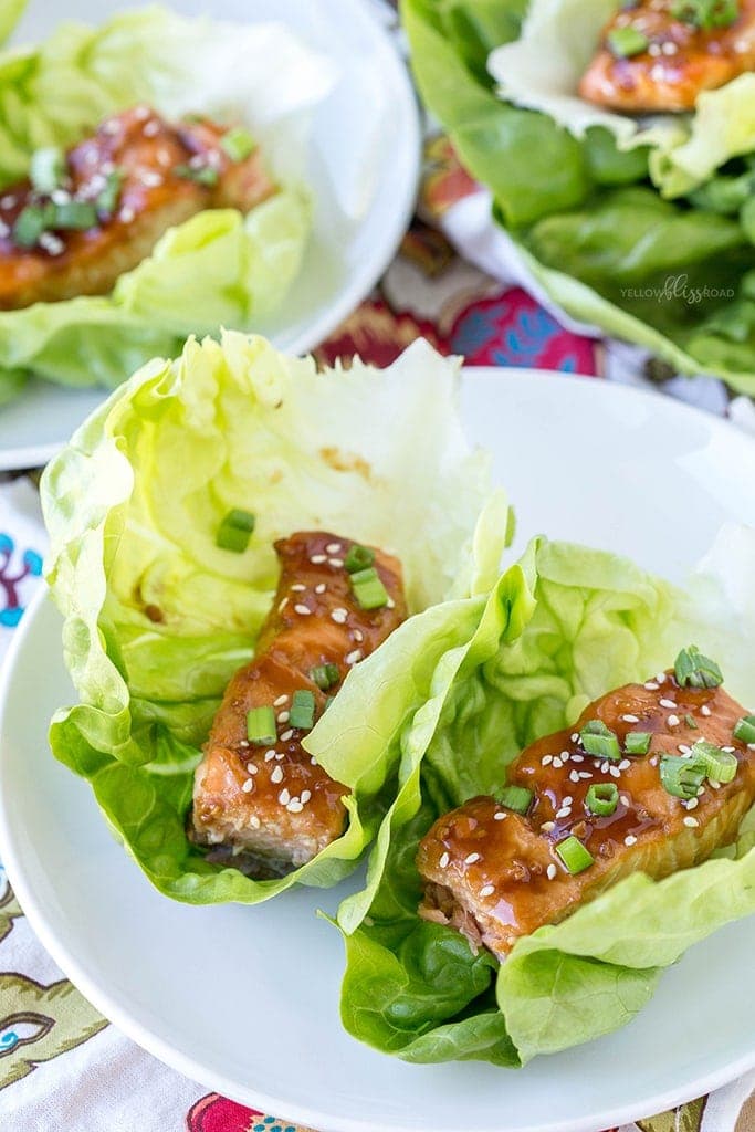 Tender, flaky pieces of Baked Teriyaki Salmon are nestled in crisp lettuce wraps. A fresh and light, protein-packed meal for lunch or dinner.