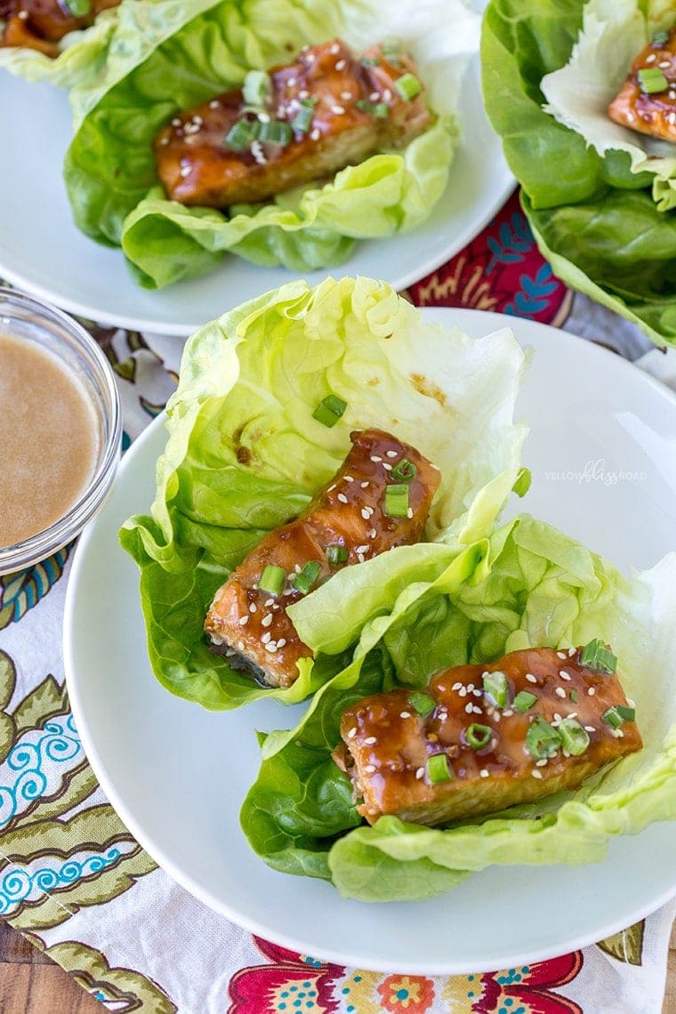 Tender, flaky pieces of Baked Teriyaki Salmon are nestled in crisp lettuce wraps. A fresh and light, protein-packed meal for lunch or dinner.