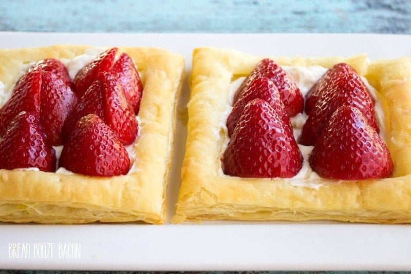 This Puff Pastry Fruit Pizza looks like a fancy dessert that's perfect for company, but it's crazy easy to make!