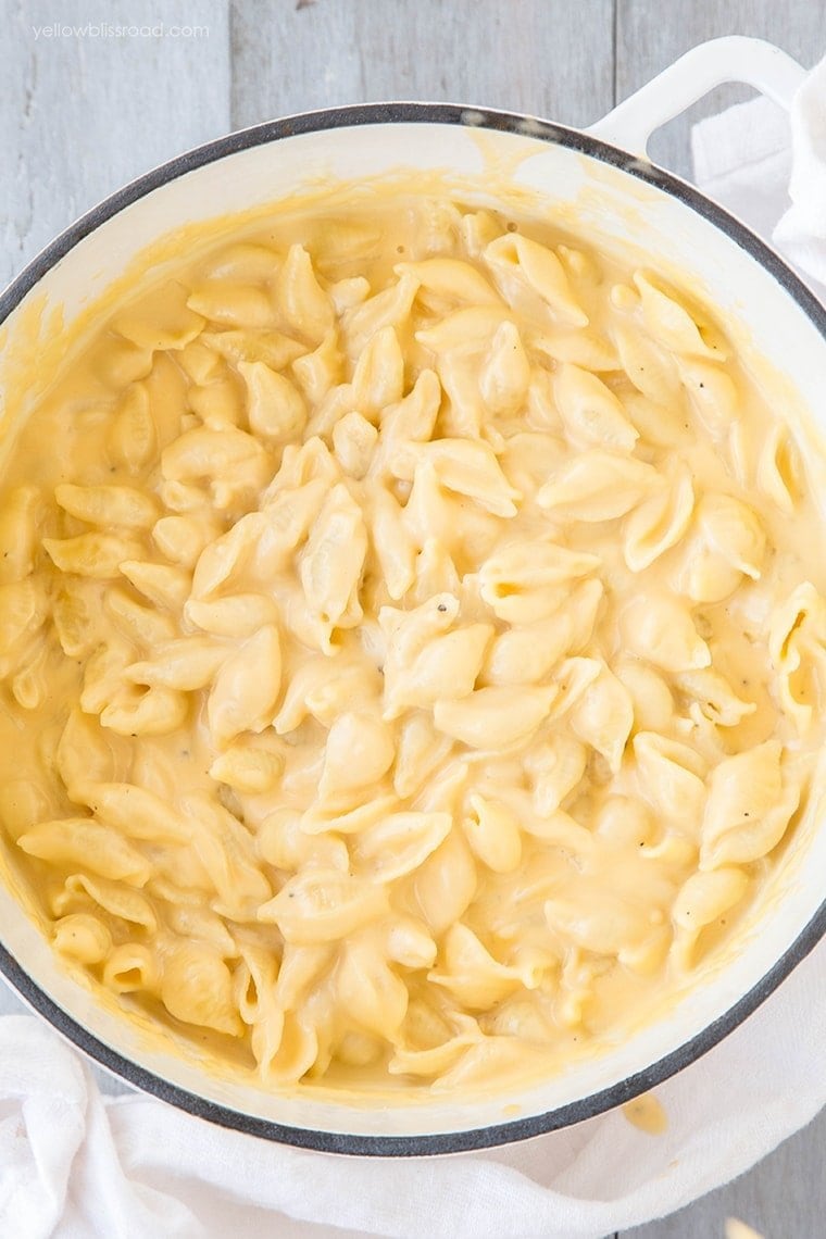 An overhead image of a large pot of mac and cheese
