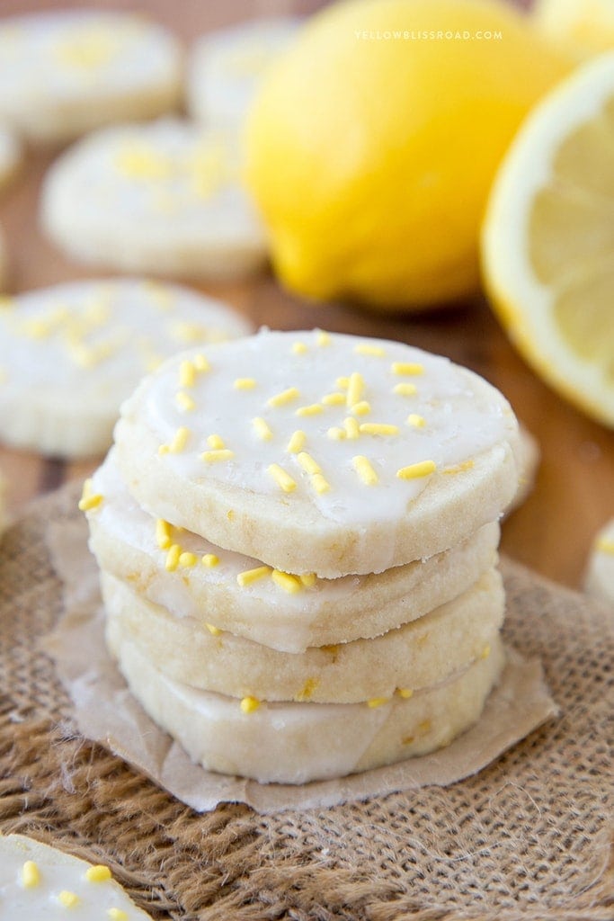 Lemon Shortbread Cookies - Rich, buttery cookies with a hint of lemon, smothered in a sweet and tart lemon icing.