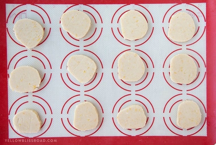 Lemon Shortbread Cookies - Rich, buttery cookies with a hint of lemon, smothered in a sweet and tart lemon icing.