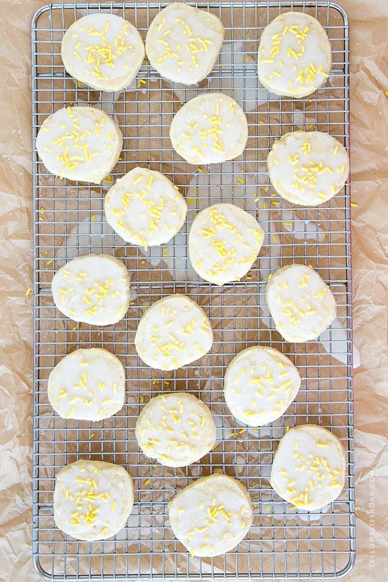 Lemon Shortbread Cookies - Rich, buttery cookies with a hint of lemon, smothered in a sweet and tart lemon icing.