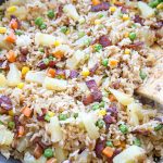 A close up of pineapple and bacon fried rice