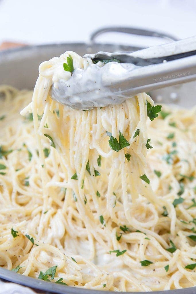 Creamy Four Cheese Spaghetti that's ready in 20 minutes! This is a fantastic and easy meal perfect for busy weeknights!